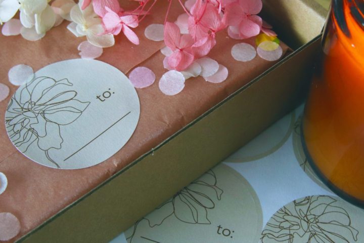 Small business packaging of a box with a circle sticker
